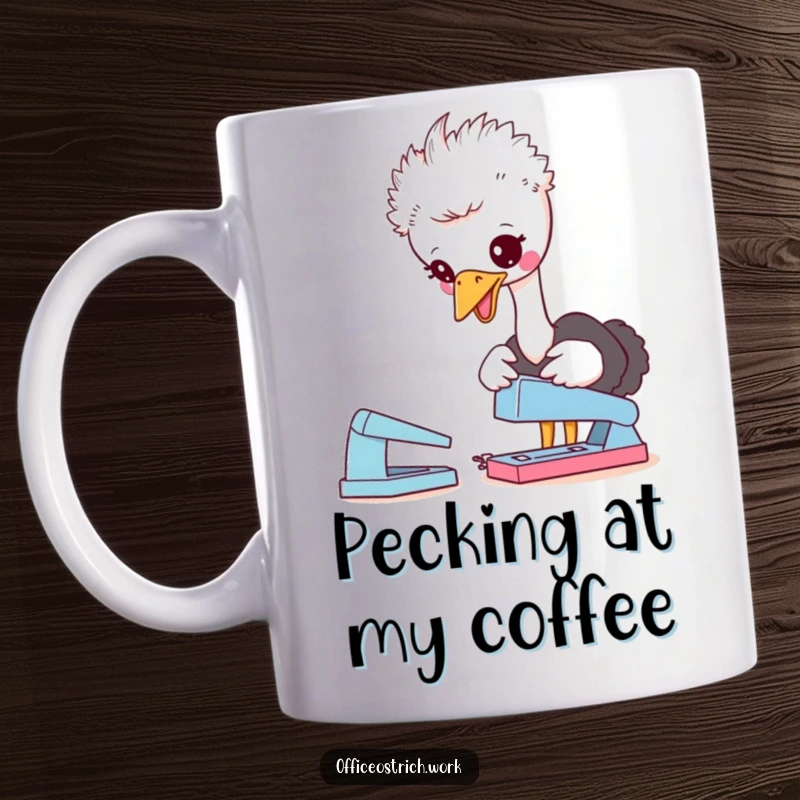 Funny mug showing a cute ostrich character curiously pecking at a stapler on an office desk, creating a humorous desk accessory.