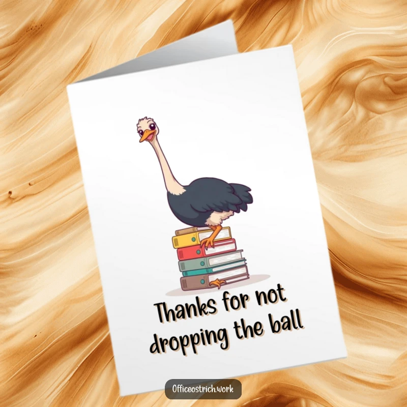 Funny Free Printable Thank You Card with an ostrich looking stressed but determined, holding many office files.