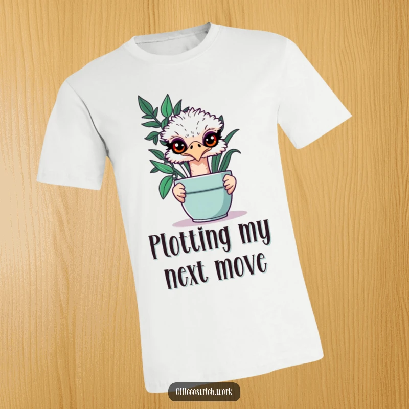 Funny ostrich with a sly grin peeking out from behind a lush green office plant on this humorous t-shirt.