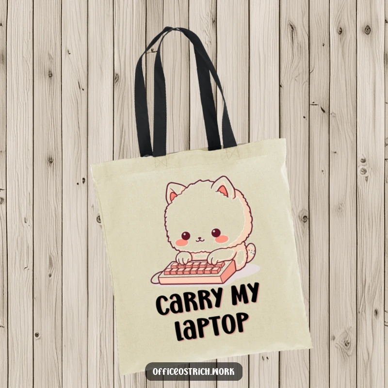 Funny fluffy round animal character with paws on a tiny keyboard, on a durable tote bag. Great for tech accessories and daily essentials.